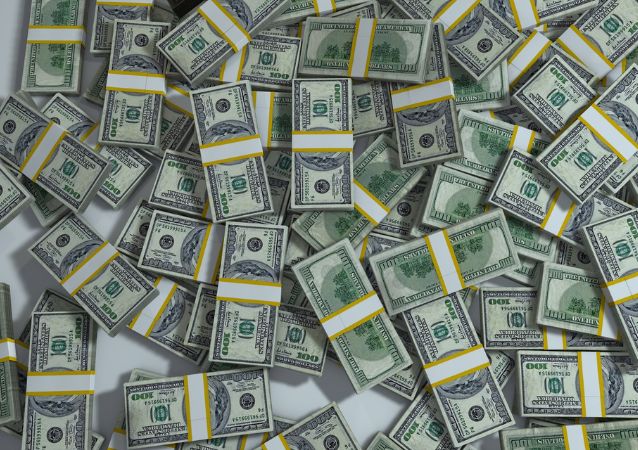 Stacks of american money is pictured in a pile, incurred to the landlord who priced their rent properly.